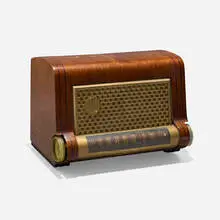 Radio, model 616A by Raymond Loewy, 1949, mahogany plywood, plastic, sold Feb 2024