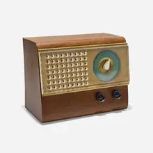 Radio, model 510 by Raymond Loewy, 1946, mahogany plywood, Bakelite, plastic, enameled metal, sold Feb 2024
