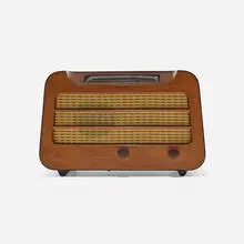 Radio, model 579 by Alexander Girard, c. 1946, walnut, plastic, steel, cloth, glass, sold Feb 2024