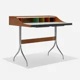 Swag Leg desk, model 5850 by George Nelson & Associates, walnut, laminate, chrome-plated steel, painted wood, plastic, sold Feb 2024