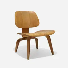 LCW by Charles and Ray Eames, 1945, aniline-dyed ash plywood, rubber, sold Feb 2024