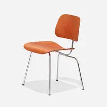 Charles and Ray Eames, DCM, 1946, molded ash plywood, chrome-plated steel, slunk skin, rubber