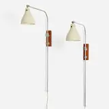 Greta von Nessen, Articulated wall lamps, pair, 1951, enameled aluminum, matte and chrome-plated steel, walnut
