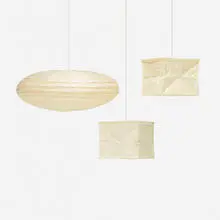 Isamu Noguchi, Collection of three Akari light sculptures, 1951, 1968, washi paper, enameled steel, bamboo