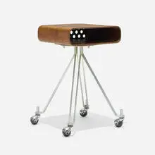 IBM dictating machine stand by Eliot Noyes and Associates, c. 1960, walnut plywood, lacquered Masonite, chrome-plated steel, aluminum, rubber, sold Feb 2024