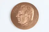 Raymond Joly, Volti, Bronze relief medallion