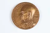 Anna Bass, Manuel de Falla, Bronze relief medallion Obverse: Profile