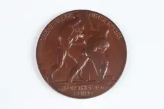 Walker Hancock, Victory of Man and Nature Over the Powers of Destruction, Bronze relief medallion with maroon patina