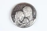 Cecil Howard, Peace Is Life-War Is Death, Bronze relief medallion with silver patina