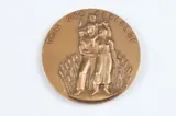 Carl C. Mose, This Is Our Heritage, Bronze relief medallion Obverse: Family standing before a field of wheat Reverse: Farmer rooting up a tree trunk