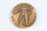 Karen Worth, The Space Age, Bronze relief medallion