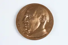 Andre Dignimont by Paul Belmondo, Bronze relief medallion, offered May 2015