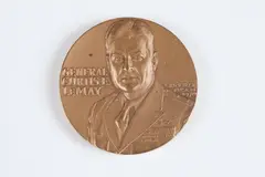 Edward R. Grove, Curtis E, Bronze relief medallion