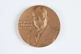 Edward R. Grove, Curtis E, Bronze relief medallion
