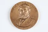 Adolph Block, Simon Newcomb, Bronze relief medallion