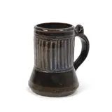 Ladi Kwali, Tankard, Stoneware, incised linear sgraffito decoration, dark brown/green glaze with blue/white highlights
