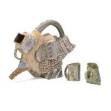 Angus Suttie, Sculptural teapot and two cup forms, circa 1988, Teapot: Stoneware, dry slips and glazes with incised linear designs