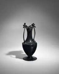 Amphora by Fratelli Toso, deep amethyst glass applied with silver leaf and ribbon handles, offered May 2023