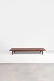 Mod. Cansado by Charlotte Perriand, Mahogany slats and black lacquered metal base, sold Jun 2023