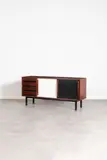 Mod. Cansado by Charlotte Perriand, Mahogany veneer, laminate and black lacquered metal, sold Jun 2023