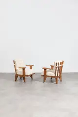 Paire de fauteuils by Robert Guillerme & Jacques Chambron, Oak, upholstered seat and back cushions, sold Jun 2023