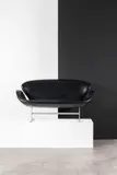 Arne Jacobsen, Mod. Swan "3321", Black leather and chromed steel