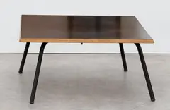 Table basse by Charlotte Perriand, Wooden top with formica and black lacquered metal tubular legs, sold Jun 2023