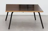 Table basse by Charlotte Perriand, Wooden top with formica and black lacquered metal tubular legs, sold Jun 2023