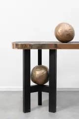 Ado Chale, Mod. Volcanique, Solid bronze top resting on two black lacquered steel tripod legs