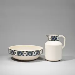 Wash basin and jug set by Joseph Maria Olbrich, circa 1910, Glazed earthenware, transfer printed decoration of stylised flowers in blue, green and black, offered Feb 2023