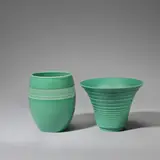 Two vases by Keith Murray: Made by Wedgwood, circa 1935, Earthenware, matt green glazes, one model no, sold Feb 2023