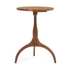Thomas Moser Cherry Candlestand, Auburn, Maine, dated 1986, ink mark "Thomas Moser Cabinetmakers, New Auburn Maine 1986" and maker's signature, ht. 26, dia. 17 1/2 in.