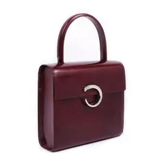 Claude Moliterni, Poșetă Cartier Panthère, din piele burgundy, provine din colecția creatoarei de modă Romanița Iovan, 1990, piele; metal