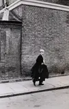 Tânăr elev britanic, în drum spre școală by Henri Cartier-Bresson, fotografie alb-negru, offered May 2019