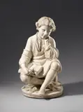 Pietro Bazzanti, The Cobbler's Boy in Love, Marble, carved in the round. A marble figure of a young man in cobbler's garb holding a book strewn with flowers on his lap and gazing absent-mindedly into the distance, his tools laying abandoned at his side. Signed to the reverse of the bench "P: Bazzanti e F: / Firenze". Several hairline cracks to the surface