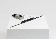 Kinetisches Objekt Nr.2 /Loks by Reiner Ruthenbeck, 1973, 2 model locomotives, rails, bumpers and transformer on panel, sold Nov 2014