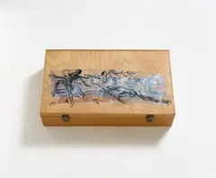 Nancy Spero, ACT UP Art Box, 1993/1994, 7 multiples of: Kiki Smith, colour photograph and glass object; Mike Kelley, wooden egg; Simon Leung, printed silk cloth; Louise Bourgeois, rubber phallus; Ross Bleckner, plastic bird; Lorna Simpson, 2 glass objects with 2 text supplements; Nancy Spero, original hand printing on the lid of the original wooden box. In original wooden box