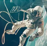 Nasa, Edward H. White floats in the zero gravity of space outside the spacecraft, Gemini IV