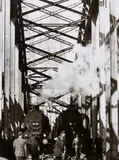 Wolf Strache, "Einfahren" der Hohenzollernbrücke, Köln (Breaking in the Hohenzollern Bridge, Cologne), 1947, Ferrotyped gelatin silver print, printed