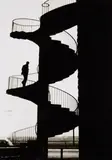 Lotte Laska, An der Rheinbrücke in Köln (At the Rhine Brigde, Cologne), 1961, Vintage ferrotyped gelatin silver print on Agfa-Portriga paper
