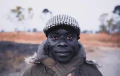 Jeff Widener, "Red Eyes", Cassinga, Angola, 2013, Chromogenic print