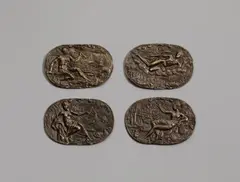 attributed to Caspar Enderlein, Four plaques representing the elements, attributed to Caspar Enderlein, Bronze, cast, engraved, chased and with an old patina. A series of oval plaques with personifications of the four elements in landscapes, each shown with their corresponding attributes and inscribed "TERRA", "IGNIS", "AER" and "AQVA". Caspar Enderlein was among the most important makers of plaques of his time, and his compositions often followed designs by Fran?ois Briot. The present lot is the only known complete series of these works, and the only version known in bronze. Individual lead cast plaques from this series are kept in the Historisches Museum in Basel and in the Victoria and Albert Museum, London. With minor wear. Each