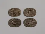 attributed to Caspar Enderlein, Four plaques representing the elements, attributed to Caspar Enderlein, Bronze, cast, engraved, chased and with an old patina. A series of oval plaques with personifications of the four elements in landscapes, each shown with their corresponding attributes and inscribed "TERRA", "IGNIS", "AER" and "AQVA". Caspar Enderlein was among the most important makers of plaques of his time, and his compositions often followed designs by Fran?ois Briot. The present lot is the only known complete series of these works, and the only version known in bronze. Individual lead cast plaques from this series are kept in the Historisches Museum in Basel and in the Victoria and Albert Museum, London. With minor wear. Each