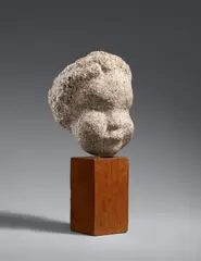 Joachim Utech, Kinderkopf, 1932, Granite sculpture on a wooden base