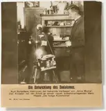 and Anonymous, Kurt Schwitters bei der Arbeit an seiner Merzplastik "Die heilige Bekümmernis" (Kurt Schwitters working on his Merzplastik "Die heilige Bekümmernis"), Vintage gelatin silver print (copy print)