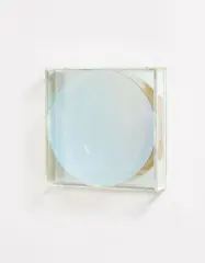 Untitled by Adolf Luther, Mirror object, concave half-transparent mirror diameter 30 cm in front of mirror on wood in plexiglas case, sold Dec 2012