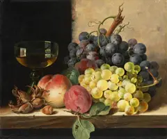 Edward Ladell, A STILL LIFE OF GRAPES, PLUMS, HAZELNUTS, A PEACH, AND A WINE GLASS ON A LEDGE, Oil on canvas