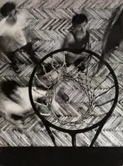 UNDER THE BASKETBOARD by Janos Szasz, Vintage ferrotyped gelatin silver print, sold Dec 2010