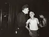 Weegee, HENRY GELLER WEEPS OVER LOSS OF HIS TABACCO SHOP, JULY 28