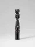 Untitled (Figure) by A. R. Penck, Bronze with black-gold patina height 35 cm, sold Dec 2008